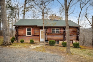 Back of cabin view and parking area