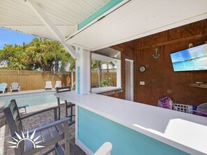 Outdoor cabana area with streaming TV