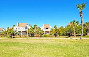 View of 947 Sealoft from the golf course in the back yard:  11th fairway of the Ocean Winds Course.