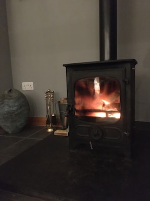 Warm up around the woodburner, our own seasoned logs supplied