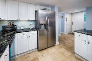 Kitchen and front entry way