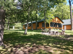 Large yard with fire pit