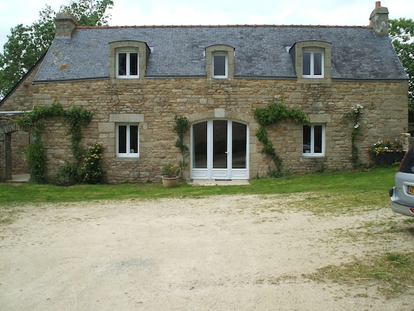 gite facade overlooking farm courtyard
