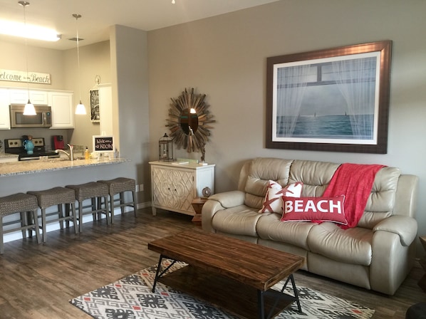 Living room with open floor plan.  Perfect for families and friends!