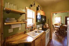 722820Cabin20120kitchen20looking20to20living20and20dining