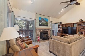 Living room looking out to balcony (Grill year round, seating in Summer)