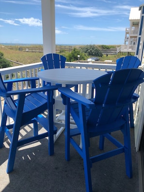 New table and chairs on the balcony overlooking the beach!