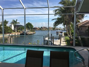 Enjoy the large 12'x28' heated swimming pool with a beautiful water view!