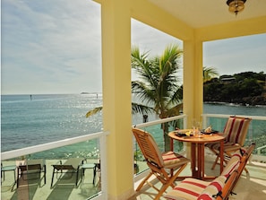 Relax on your an ocean view balcony with expansive views and warm island breezes