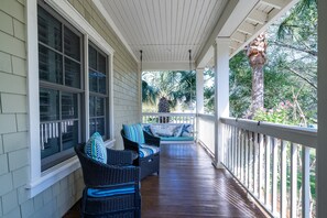 An expansive front porch. Sit drinking your morning coffee and planning the day ahead