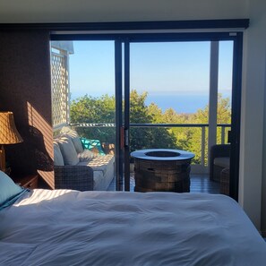 An ocean view from bed.
