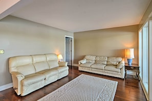 Relax and unwind on the plush furniture in the living room.
