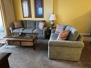 Living room with a pull out queen sofa with upgraded foam mattress!!!