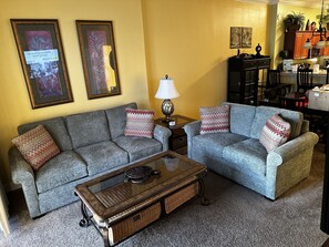 Living room with queen pull out sofa with upgraded foam mattress