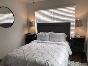 comfy queen size bed with all linens