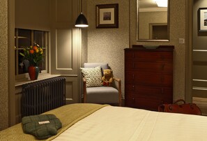 Bedroom:  tastefully furnished, a peaceful refuge insulates you from all around.