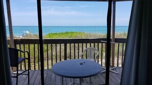 View of beach from living room window and private deck! 
