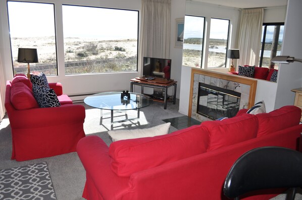 Living Room with Fireplace... views of sand dunes, ocean, river and Monterey