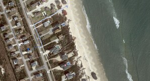 Blue arrow is marked the walkway to the beach.