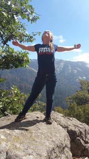 Stopping for a pose while hiking in the woods
