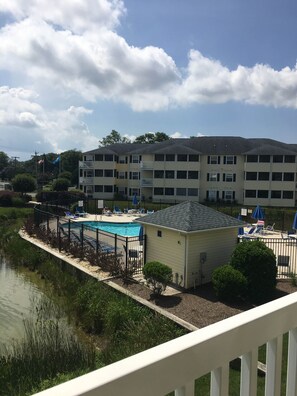 The second porch offers a dual sided view of the outdoor pool. 