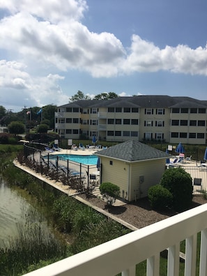 The second porch offers a dual sided view of the outdoor pool. 