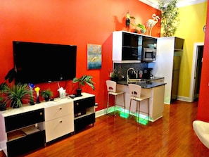 Galley style kitchen, 75" Smart TV, sleeper sofa, sleeps 2, sitting chair