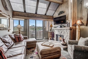 Living Area with wood burning fireplace
