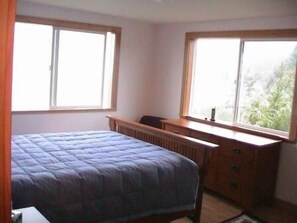 The Master Bedroom - Full Ocean Views & a TV with Premium Channels.