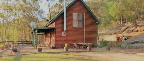 Our cabin with several outdoor seating options