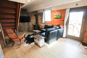 Living room with gas stove.  Cozy ambiance with the touch of a button!