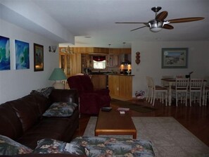 Living Area w/ Games inside Ottoman and in Custom China Cupboard