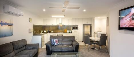 Main combined family, lounge, kitchen, dining and small laundry