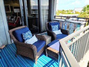 2 Comfy chairs to enjoy on the balcony.