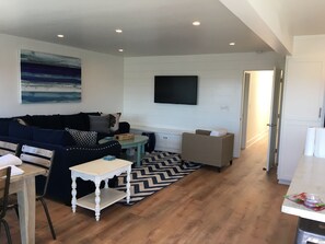 Bench under tv has blankets & games! Wifi and cable included. 