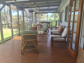 Huge screened deck, overlooking Curley's Bay (the river)