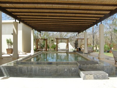 Refresh and rejuvenate in the hot and cold plunge pools at the beach club.