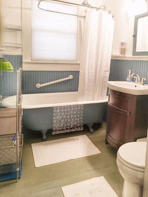 The full bath has a clawfoot tub with a shower.