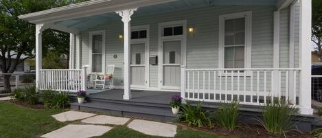 Two front doors is common with this style of 1890's house.