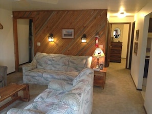 Lower Level living room, looking towards bedrooms (kitchen & dining rm to right)