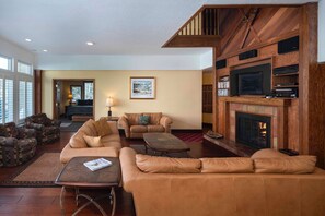 Family room fireplace open to 2nd floor above