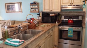 Stainless Steel Sink, Silstone Countertops, Custom Cabinets!