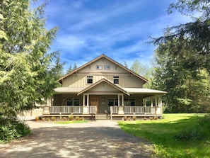 Front entry of Lodge with large wrap around porch.