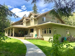 Large deck for outdoor dining, equipped w/ gas BBQ. Yard games provided