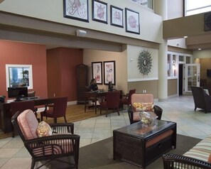 Seating area in the lobby at check in. Entry to Roma's Italian Restaurant
