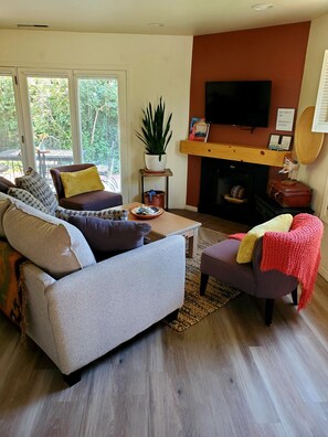 Smart TV with cable, fireplace and comfy furnishings.  *FP decorative only 