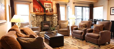 Living room with free standing gas fireplace