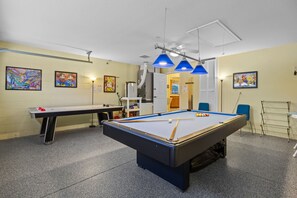 Let the games begin! Pool table, air hockey, darts and TV.