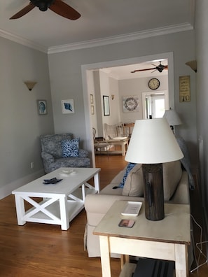 Front parlor with TV and sleeper sofa.