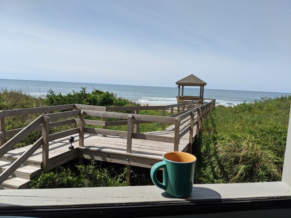 Coffee on the deck rail looking out to the ocean